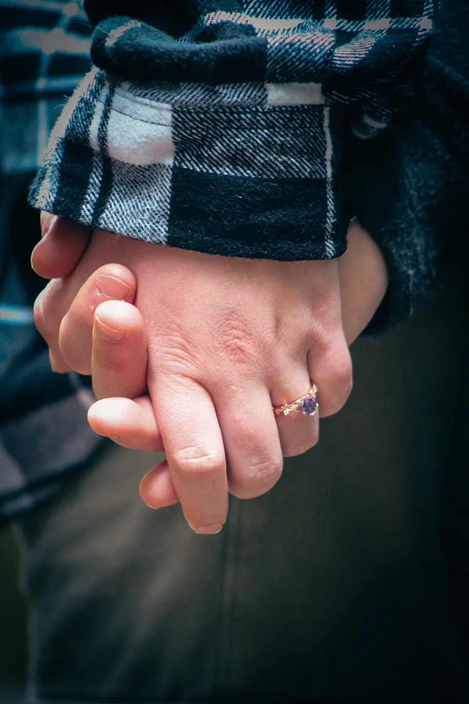 Matthew and Christine holding hands